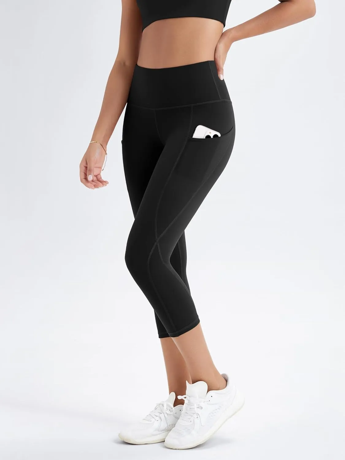 ODODOS Women's High Waisted Yoga Capris with Pockets, Tummy Control Non See Through Workout Athletic Running Capri Leggings